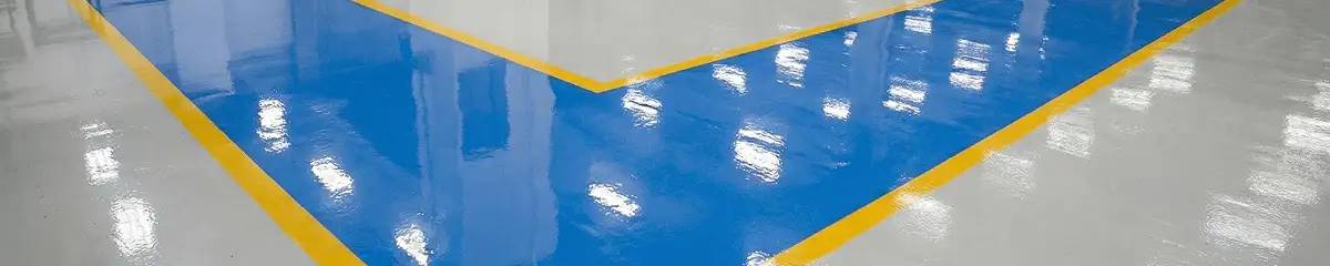 A factory floor professionally covered and marked with epoxy flooring in Cape Coral, FL