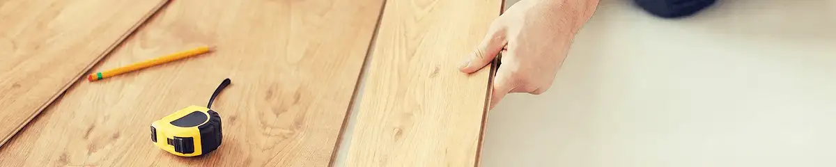A professional installing wood flooring in Cape Coral, FL