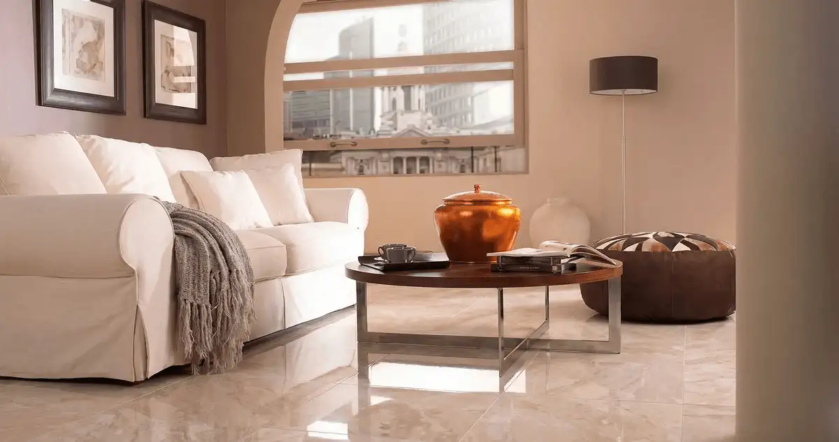 Modern living room with professionally installed marble flooring, a beige sofa, coffee table in Cape Coral, FL