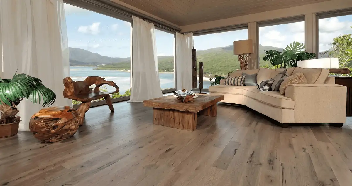 Professionally installed vinyl flooring in a modern living room with large windows in Cape Coral, FL