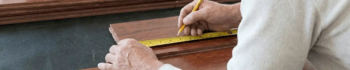 A professional installing wood flooring in Cape Coral, FL